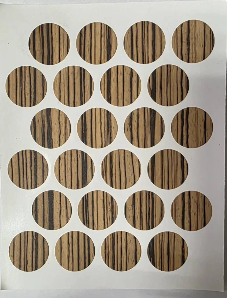 Заглушка самоклеящаяся д.18 мм 24шт. зебрано светлый